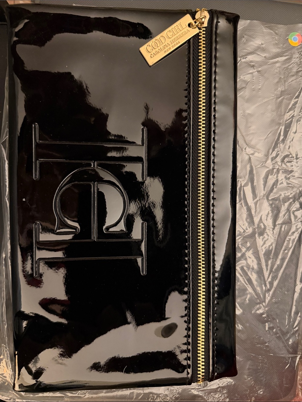 Carolina Herrera Black Patent Clutch with Gold Tag